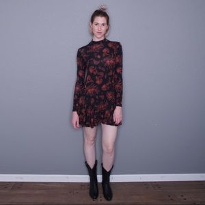 Long sleeve fit and flare dress.